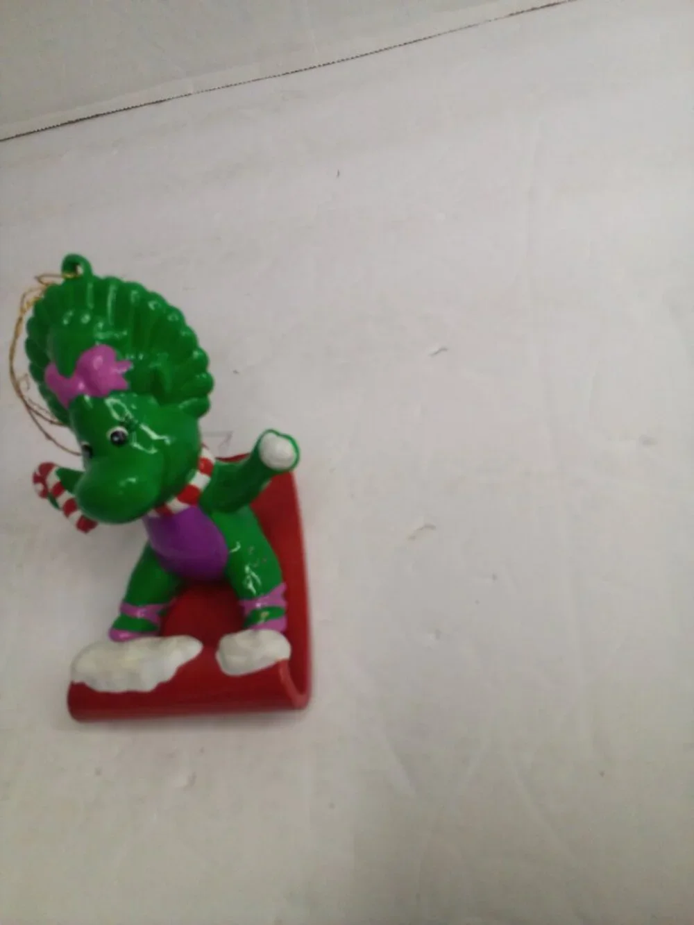 Baby Bop Sledding Christmas Ornament Plastic Barney 2000 Lyons Partnership